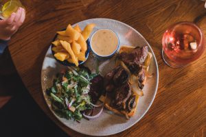 beef baguette chips pepper sauce side salad amd wine at The Crowes Nest sunday lunch enniskillen - pub food enniskillen